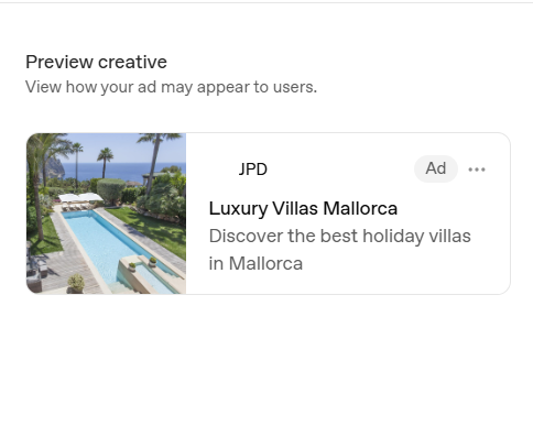 A luxury Mediterranean villa surrounded by lush greenery and water features under a clear sky.