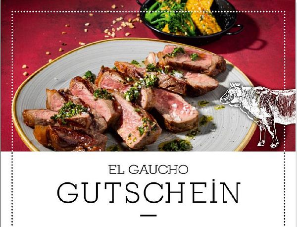 A beautifully plated dish featuring sliced steak with garnishes, accompanied by vegetables.