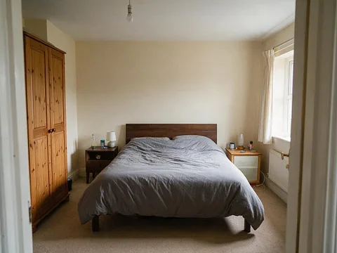 Before: A bedroom, before and after being restyled as Japandi