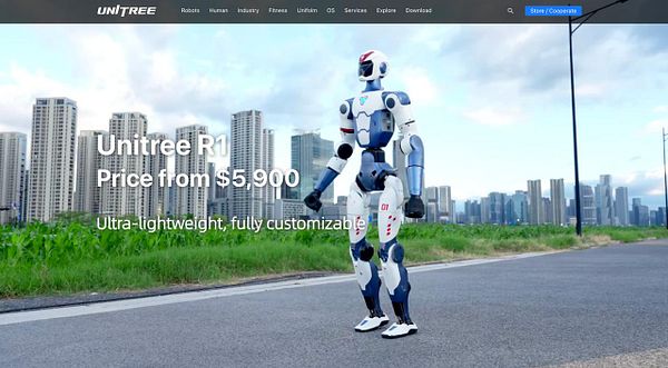 A humanoid robot, the Unitree R1, is displayed against a backdrop of modern skyscrapers.