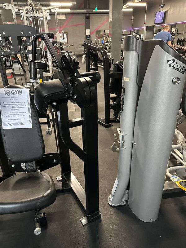 The image features gym equipment in a fitness center.