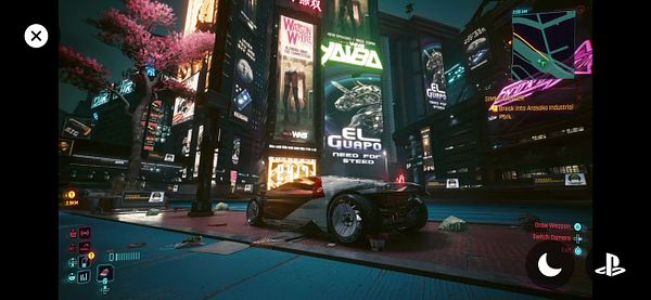 A futuristic cityscape featuring neon lights and a sleek vehicle parked in a vibrant environment.