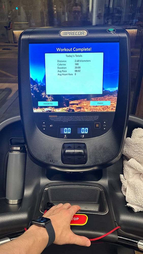The image displays a workout summary on a treadmill console after completing a session.
