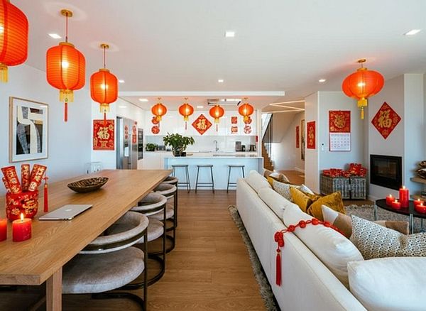 A modern living space decorated with red lanterns and festive ornaments.