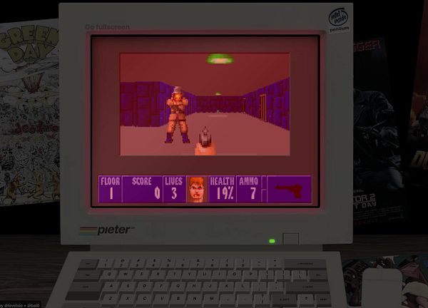A retro computer displays a scene from the game Wolfenstein 3D.