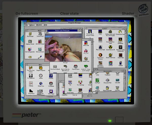 Screenshot of a Windows 7 system tray with device-related notifications and webcam devices shown.