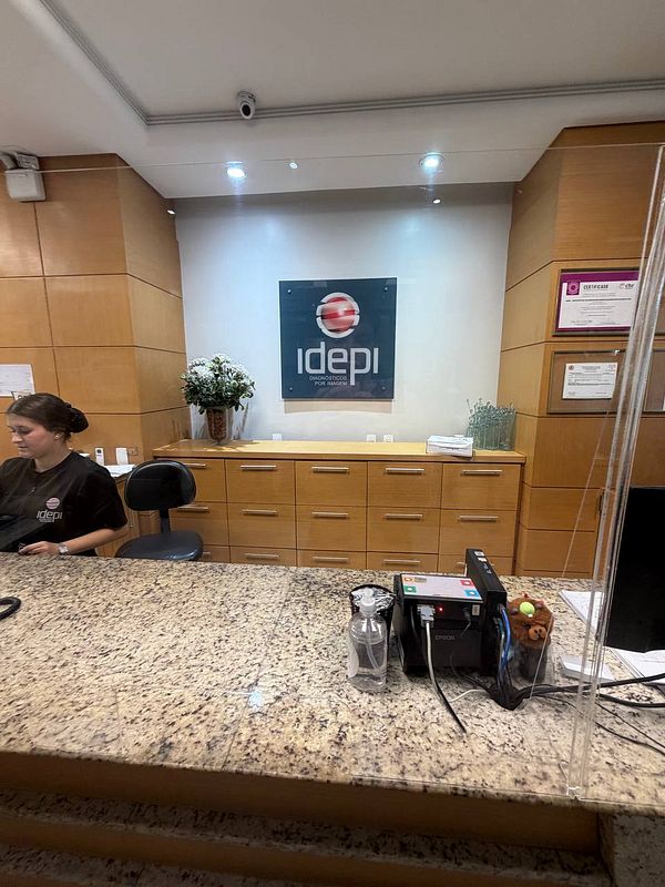 Ultrasound scan image showing a detailed view of arterial structures with Doppler color flow signals.