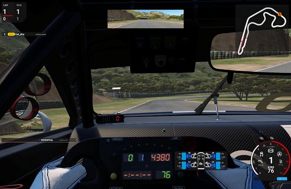 Screenshot of the game Automobilista 2 showing a racing car on a dirt track with game interface elements.