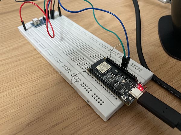 A breadboard setup featuring a microcontroller and various connected wires.