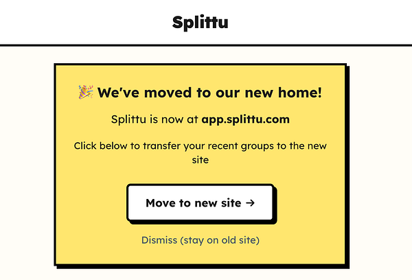 A modern, well-organized office workspace with a large cityscape view through the window.