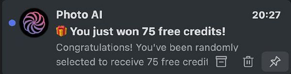 A notification message announcing a credit win from Photo AI.