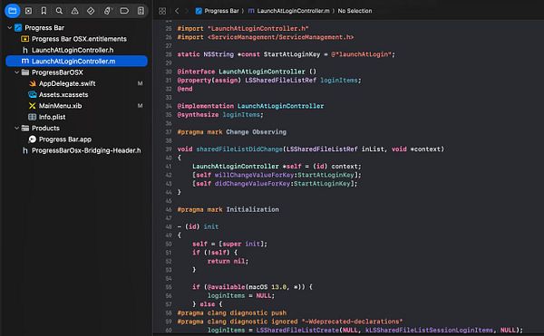 Screenshot of Objective-C code in Xcode for setting an app to launch at login using SMLoginItemSetEnabled.