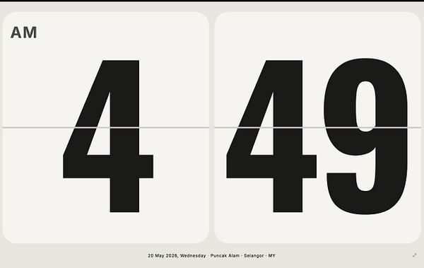 Screenshot of a digital flap clock interface showing the date, day, time in 12-hour format with AM/PM toggle, and a website footer link.