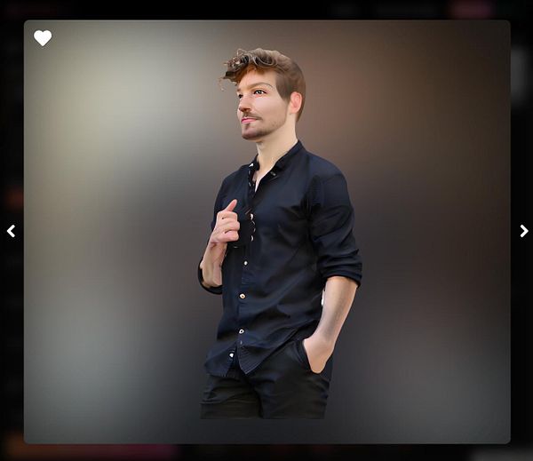 A young man in a black shirt poses against a blurred background.