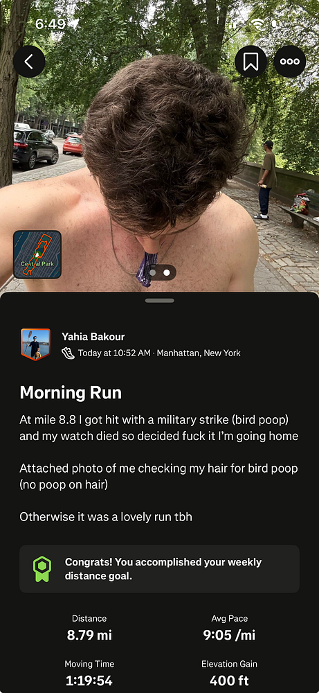 A runner checks his hair for bird droppings after a long run in Central Park.