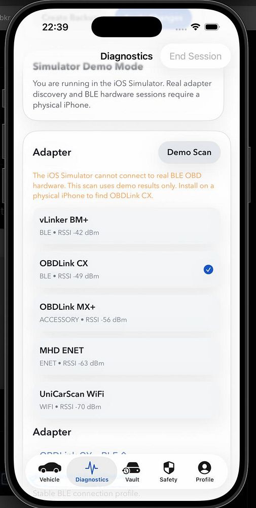 ObdLink CX Adapter and its packaging are displayed on a wooden surface.