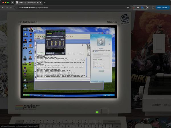 A vintage Windows XP desktop screen is displayed on an old-style CRT monitor with a beige keyboard and mouse on a wooden desk.