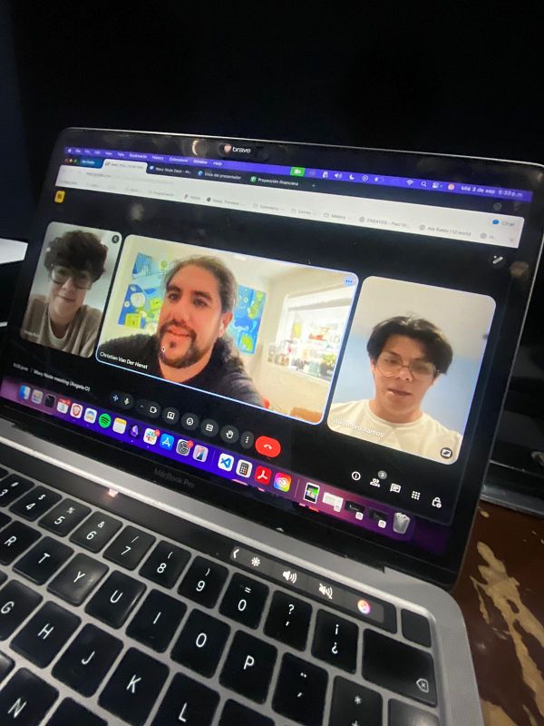 A video call featuring three participants discussing a pitch with a potential investor or incubator.