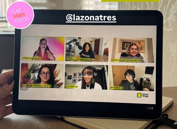 A virtual panel discussion featuring women in tech, displayed on a tablet.