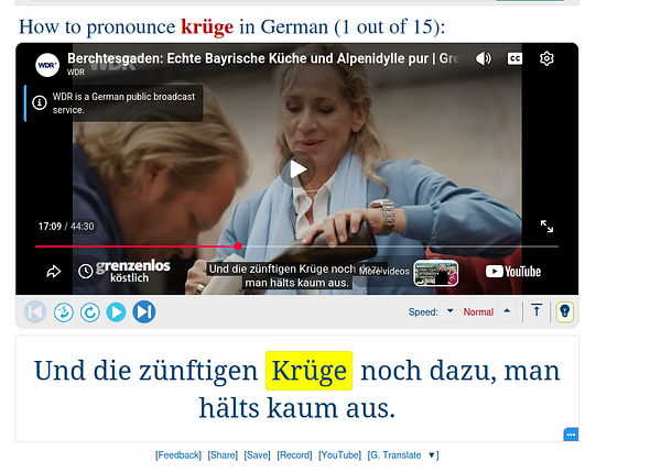 Screenshot of an online German pronunciation lesson highlighting the word 'Krüge' with a paused YouTube video showing two people and German text.
