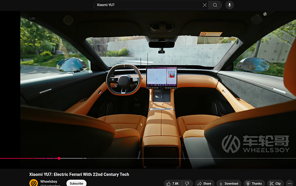 The image features the interior of a Xiaomi YU7 electric vehicle, showcasing a modern and luxurious design.