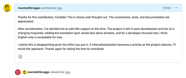 Screenshot of a GitHub pull request discussion and code changes for internationalization (i18n) feature.
