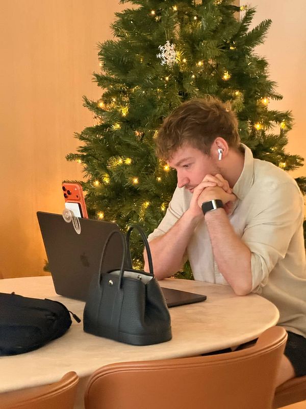 Handwritten notes on a white paper discussing negotiation points about a letter of intent (LOI) acquisition.