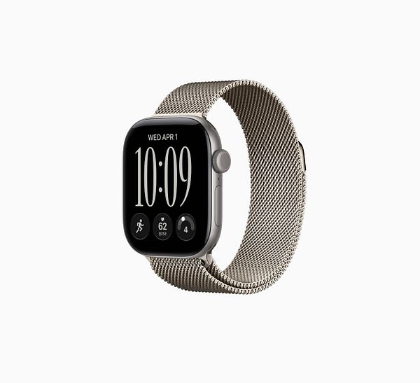 Top-down view of an Apple Watch Ultra with a highlighted yellow Action button and an open watch app interface on a wooden surface.