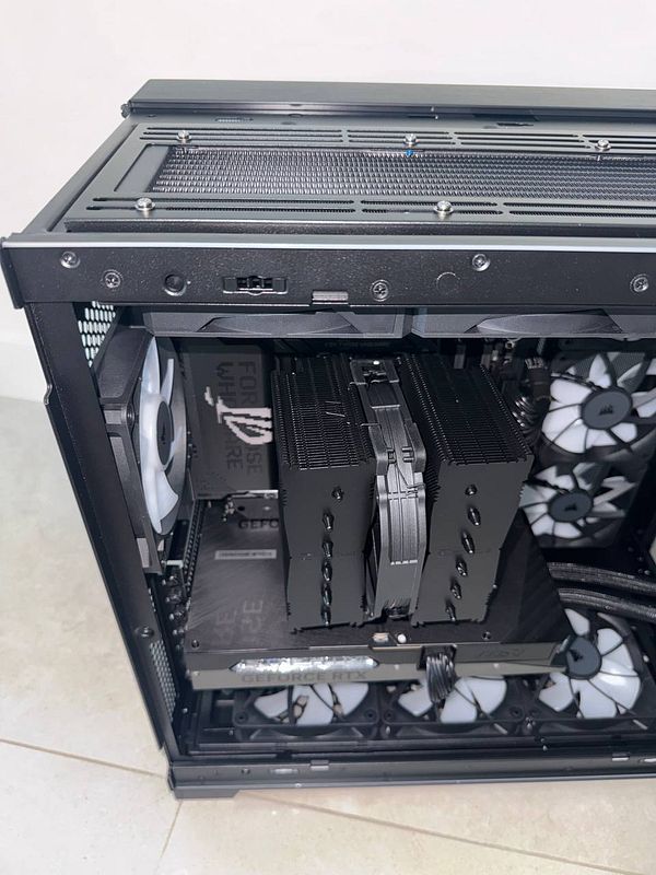 The image depicts a partially assembled flight simulation computer with a CPU cooler that is not fully attached.