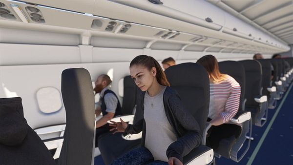 The image depicts the interior of an A318 aircraft with passengers seated.