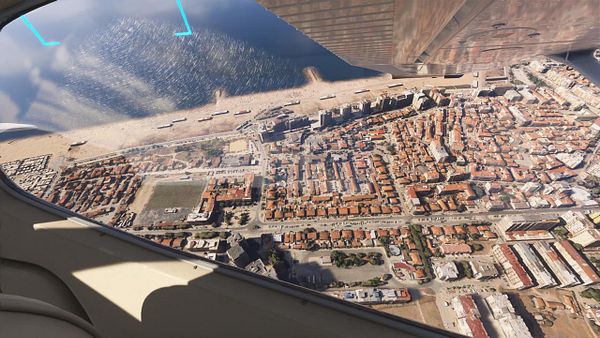 Aerial view of Costa de Caparica showcasing urban and beach areas.
