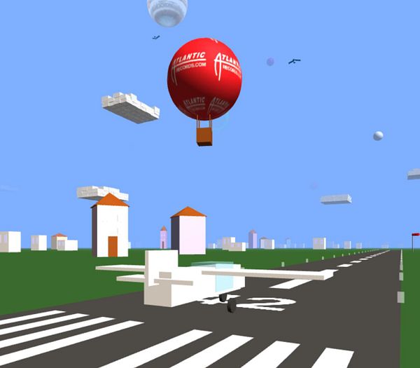 A whimsical 3D landscape featuring a hot air balloon, a small airplane, and simplistic buildings.