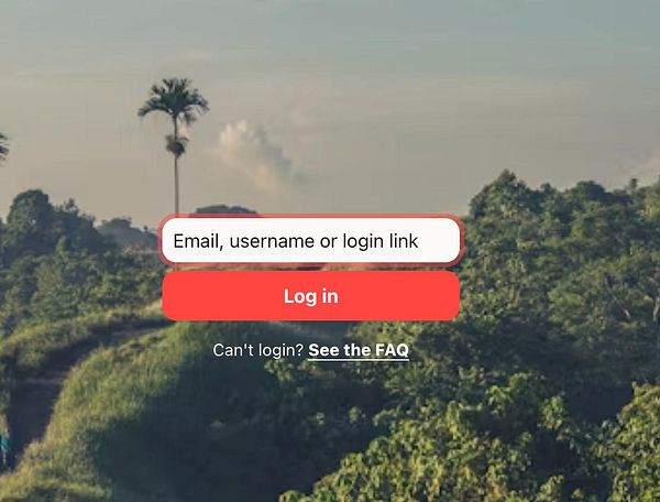 The image features a login screen overlaying a scenic landscape.