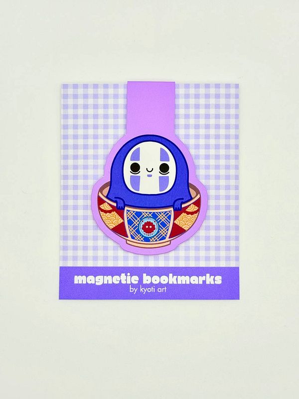 A colorful product display featuring a magnetic bookmark designed by Kyoti Art.