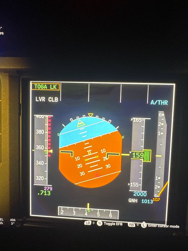 The image displays a cockpit instrument panel showing flight data and navigation information.