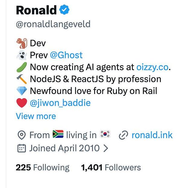 A blue illustration featuring a stylized rocket launching upwards with pixel-like debris and abstract shapes, set against a dark background with star-like dots.