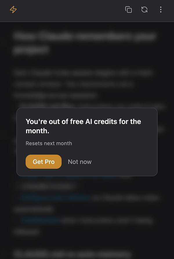 Screenshot of a code editor showing a React component and a task description comment about upsell from Free to Pro.