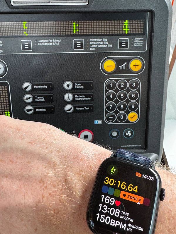 A front-facing photo of a red Stairmaster exercise machine against a plain background.