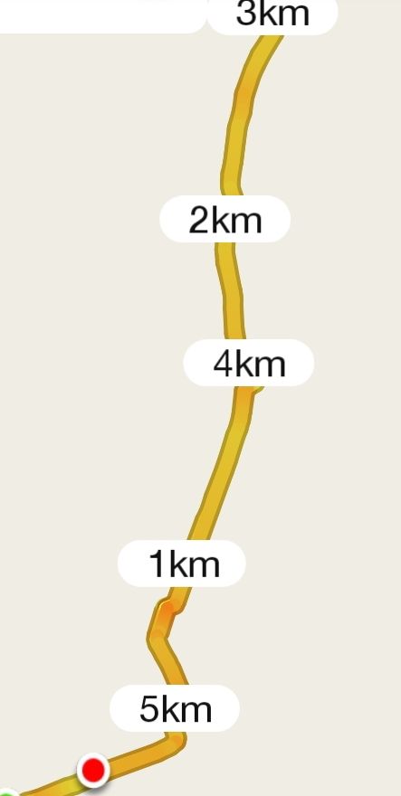 The image displays a map segment indicating a 5km running route with distance markers.
