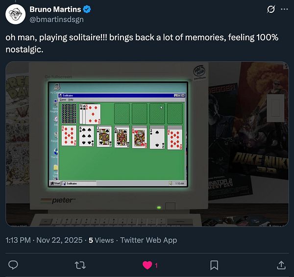 A nostalgic scene featuring a Windows 95 Solitaire game on a vintage computer.