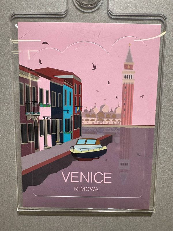 A colorful illustration of Venice featuring iconic architecture and a canal scene.