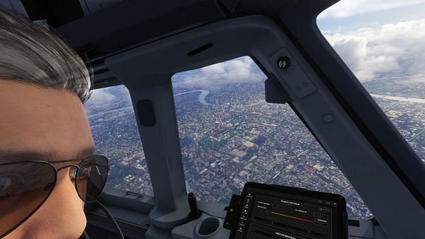 Screenshot of a flight simulator displaying an aircraft on final approach for landing at an airport.