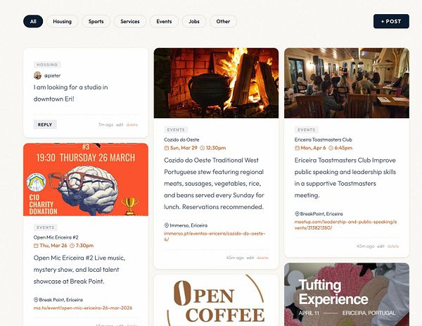 A modern outdoor patio area constructed with a variety of natural stone materials and incorporating a seating area under a wooden pergola is shown.