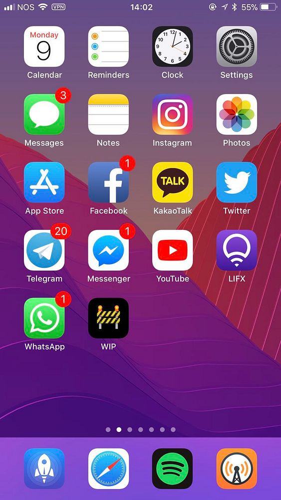 The image shows a smartphone home screen with various app icons.