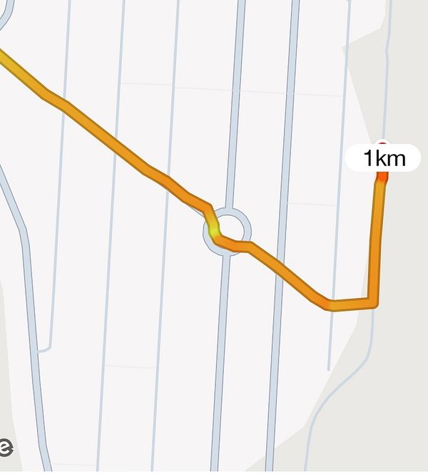 A running route map showing a distance of 1 kilometer.