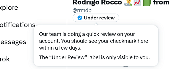 A Twitter account interface displaying an 'Under review' status for a user.