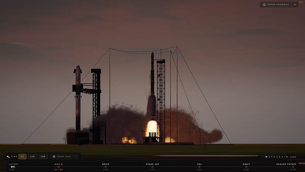 A rocket launch at dusk with a clear sky and launch infrastructure visible.