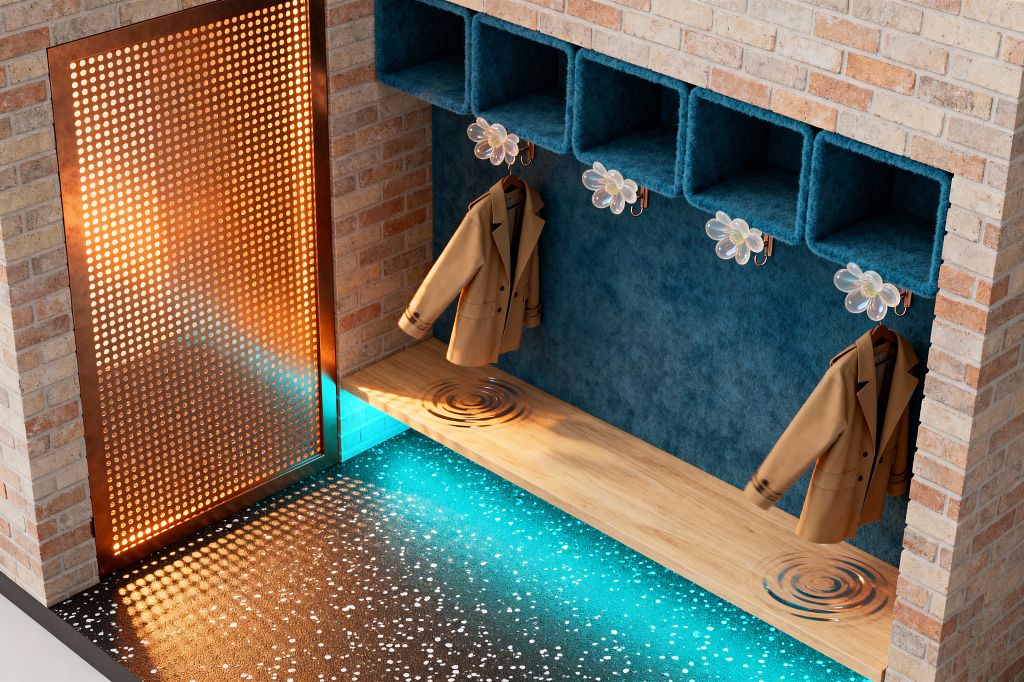 A brick-lined mudroom features a built-in oak bench with deep-teal upholstered cubbies above and iridescent flower-shaped hooks holding tan coats. A perforated copper screen casts warm dotted light onto a black terrazzo floor with white flecks, while aqua underlighting creates a pool-like glow and concentric ripple-like illusions on the bench, adding a surreal, dreamlike effect.