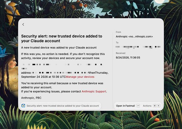 Email interface showing a security alert about a new trusted device added to a Claude account with options to manage devices and open the email in Fastmail.