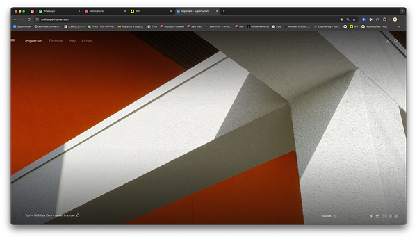 The image features a modern architectural design with contrasting colors and geometric shapes.